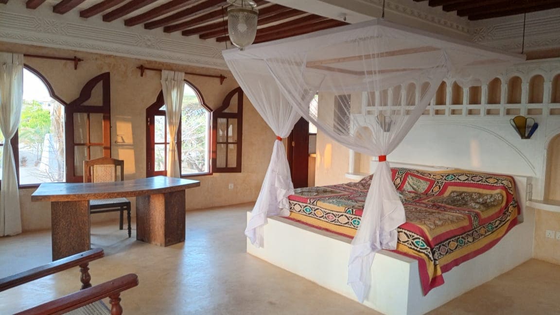 Bedroom at Little Nyumba ya mwezi with ocean-inspired tones